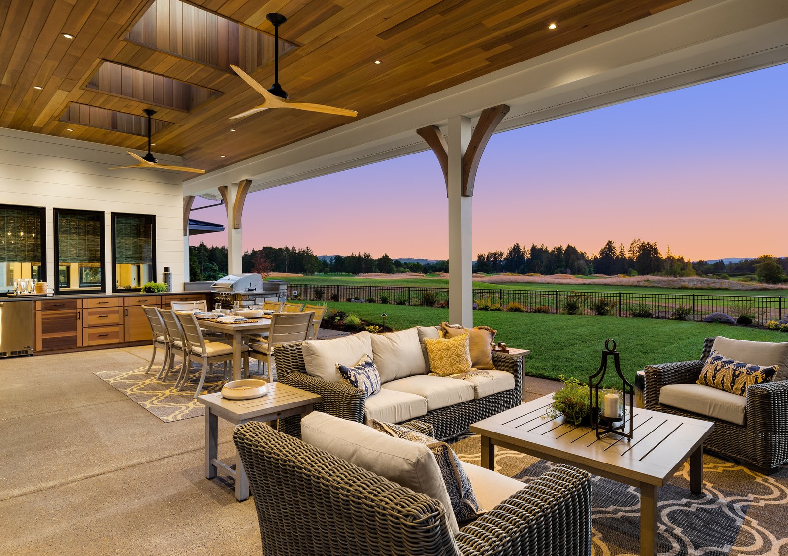 Woodland Estate backyard patio at dusk — custom home by Reschka Design Build